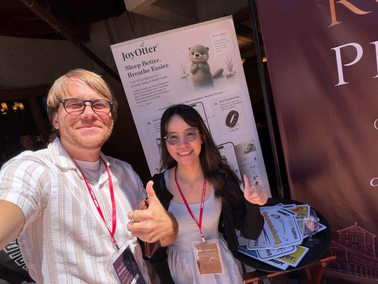 Two attendees together at the Stanford event